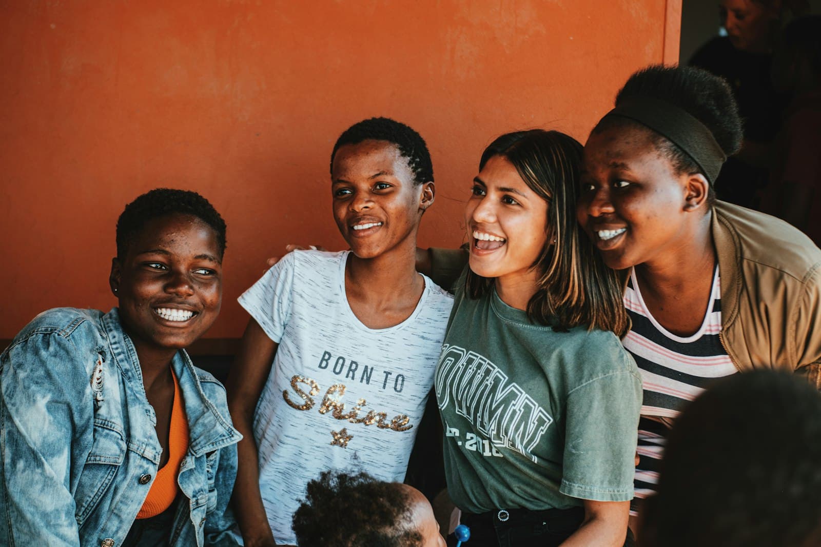 A group of young people smiling together